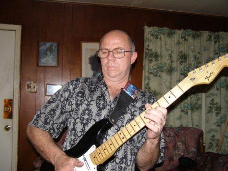 Faron Collins picking a Stratocaster